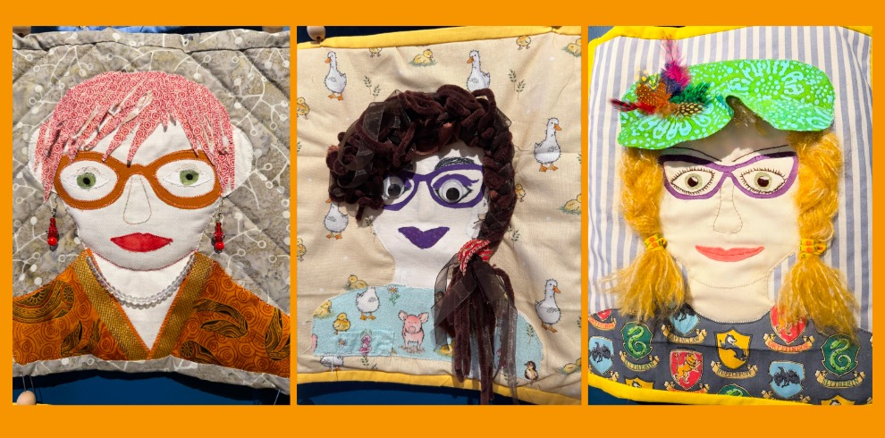 A three‑panel image shows fabric portrait squares, each designed with textured, tactile elements. Left panel: A quilted square featuring a patterned headdress in pink and white, a grey quilted background, and an ornate orange garment with swirling designs and white lace‑like trim. Middle panel: A fabric square with a beige background decorated with illustrations of geese and other small animals. Dark brown, textured yarn is attached to create long, curly hair that extends downward. Right panel: A square with a striped blue‑and‑white background and a colorful printed border featuring various animal emblems. Bright yellow braided yarn represents long hair, and a green patterned fabric forms a headpiece adorned with small colorful feathers.