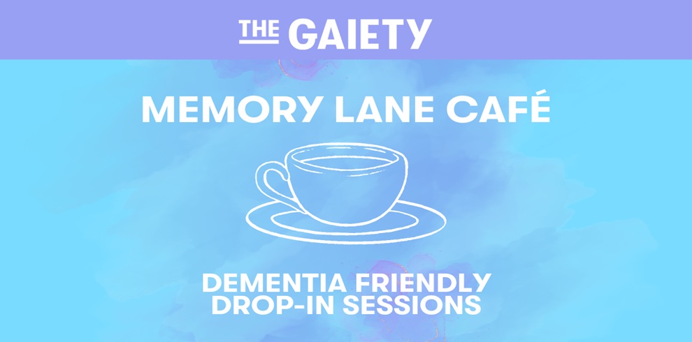 Promotional graphic for The Gaiety Memory Lane Café showing a soft blue background with white text reading ‘The Gaiety – Memory Lane Café’ and ‘Dementia Friendly Drop‑In Sessions.’ A simple line illustration of a teacup and saucer appears at the centre, creating a calm and welcoming café theme.
