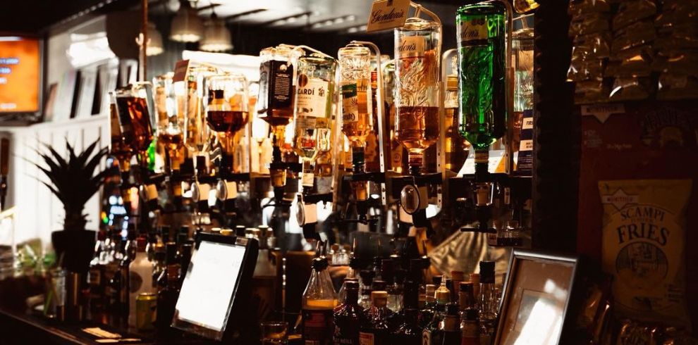 An image of a bar with optics within a pub setting.