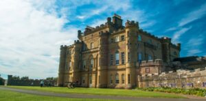 Stunning large castle overlooking beautiful gardens.