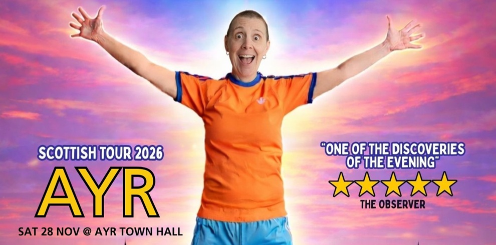 Promotional poster showing a person in an orange athletic shirt and blue shorts standing with arms stretched wide against a colourful sunset sky in shades of pink, purple, and blue. Large text on the left reads “Scottish Tour 2026 AYR,” with smaller text below stating “Sat 28 Nov @ Ayr Town Hall.” On the right, a quote reads “One of the discoveries of the evening” alongside a five-star rating and “The Observer.”