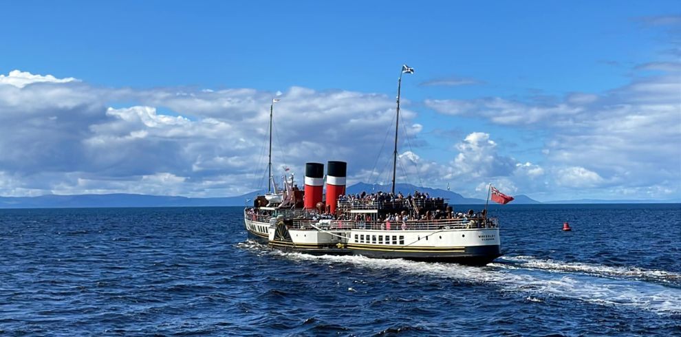 An image of the paddle steamer Waverley heading away from Ayr harbour.