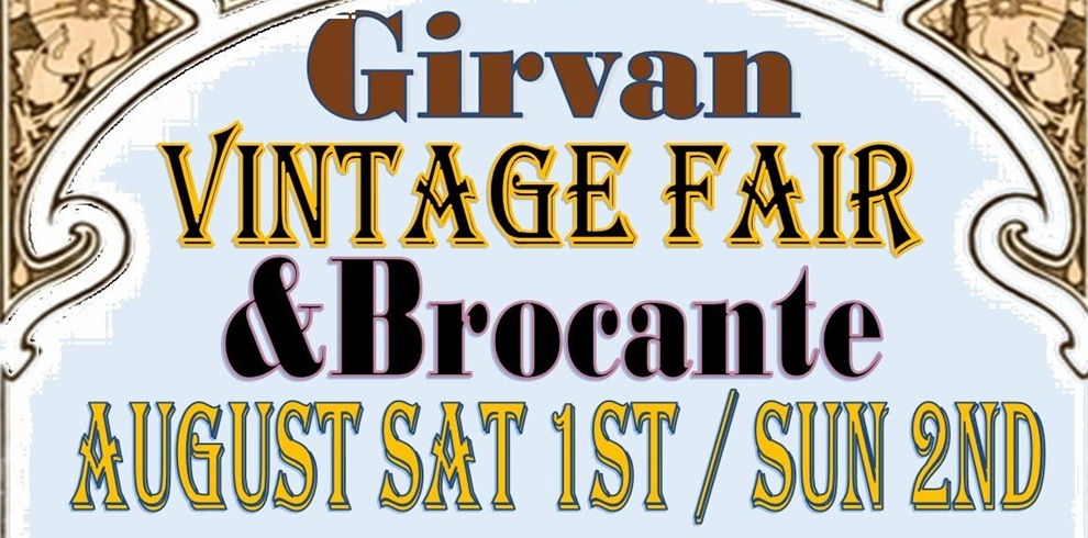 Vintage-style event poster for “Girvan Vintage Fair & Brocante.” The design features decorative, ornate borders in beige and gold against a pale blue background. Large stylised text reads “Girvan Vintage Fair & Brocante,” with “AUGUST SAT 1ST / SUN 2ND” displayed below in bold yellow lettering. The typography has a classic, antique feel with contrasting colours including gold, black, and pink accents, giving the poster a nostalgic, vintage aesthetic.