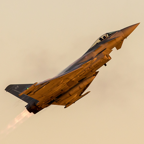 Typhoon aircraft at an upright angle in flight.