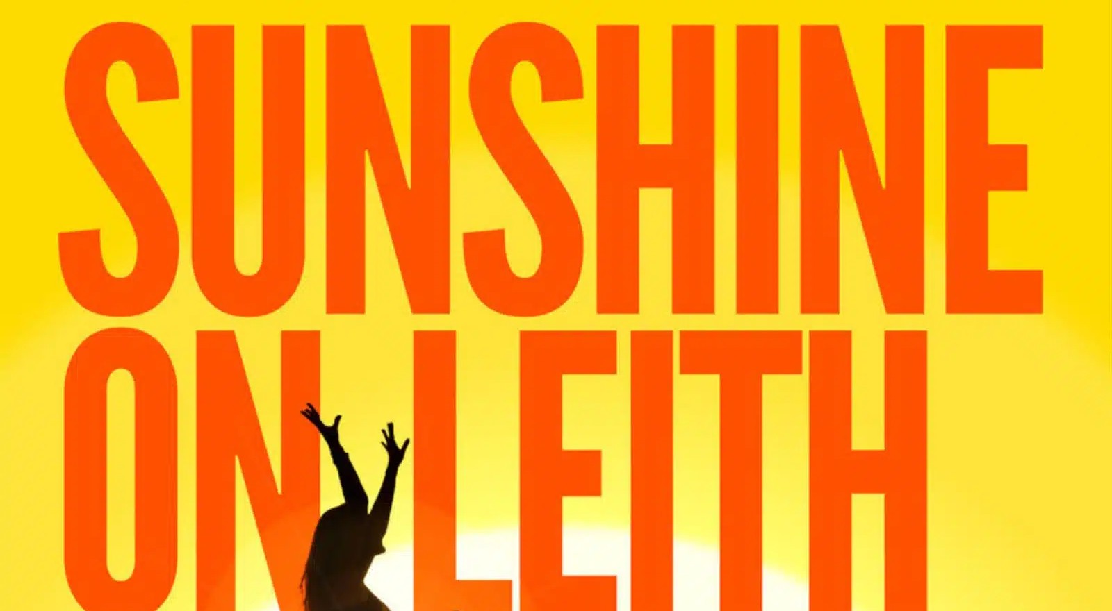 Promotional poster for Sunshine on Leith featuring the title in large, bold orange letters across a bright yellow background. A glowing sun rises behind the text, creating a warm gradient effect. At the bottom centre of the image, the silhouette of a person with raised arms stands against the sunlight. The vibrant colour scheme and sunlit backdrop evoke themes of optimism, celebration and music.