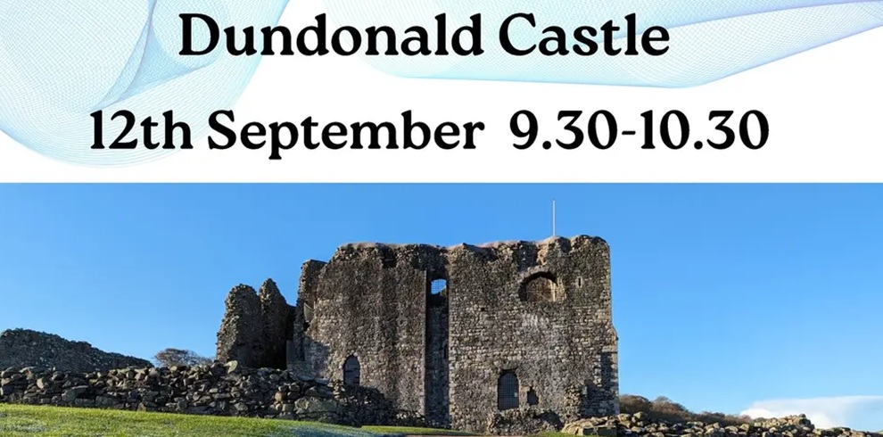 Promotional poster for a Tai Chi session at Dundonald Castle. The poster features the text “Dundonald Castle” and “12th September 9.30-10.30” above a photograph of the historic stone castle ruins. The castle stands on a grassy hillside behind a low stone wall under a clear blue sky. A light blue abstract wave pattern decorates the top of the poster.