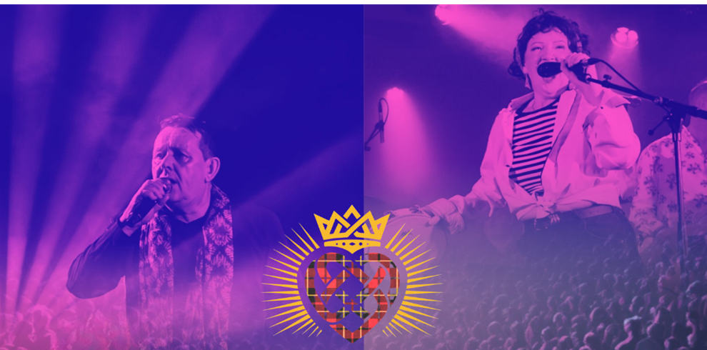 Promotional concert-style graphic featuring two singers performing on stage under purple and pink spotlights. One performer is shown on the left holding a microphone, while another performer is shown on the right singing into a microphone. A crowd silhouette fills the lower background, and a colourful heart-shaped emblem with radiating gold lines is centred near the bottom of the image. The overall design uses vibrant purple and magenta tones with dramatic stage lighting.