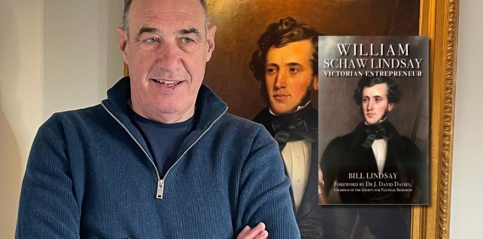 Author Bill Lindsay posing in front of a painting to promote his new book 'WILLIAM SCHAW LINDSAY: VICTORIAN ENTREPRENEUR'.