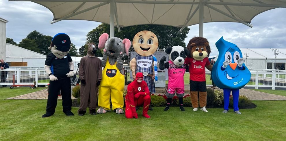 A photograph of characters at racecourse family funday.